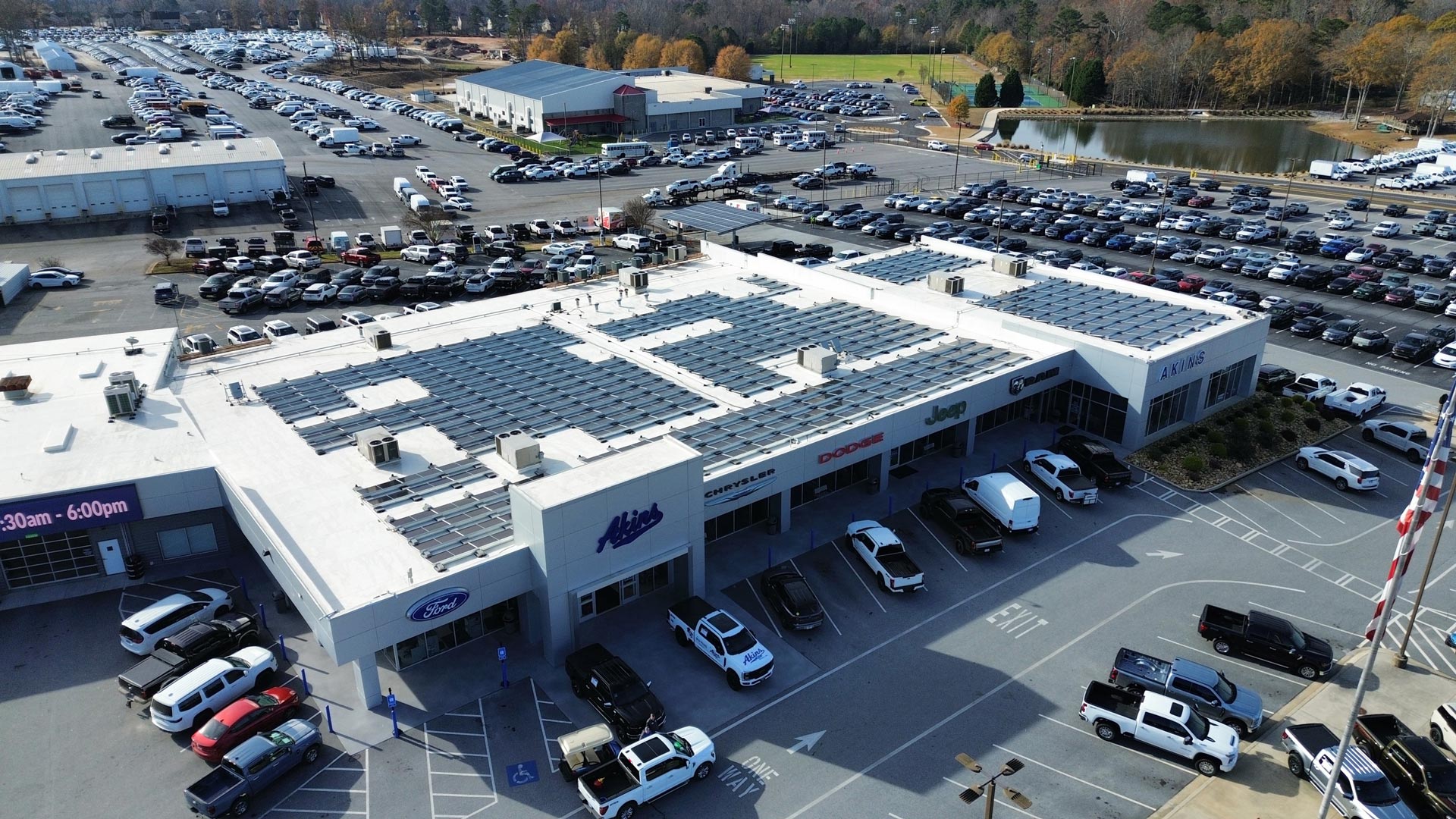 car sales building with solar panels on the roof