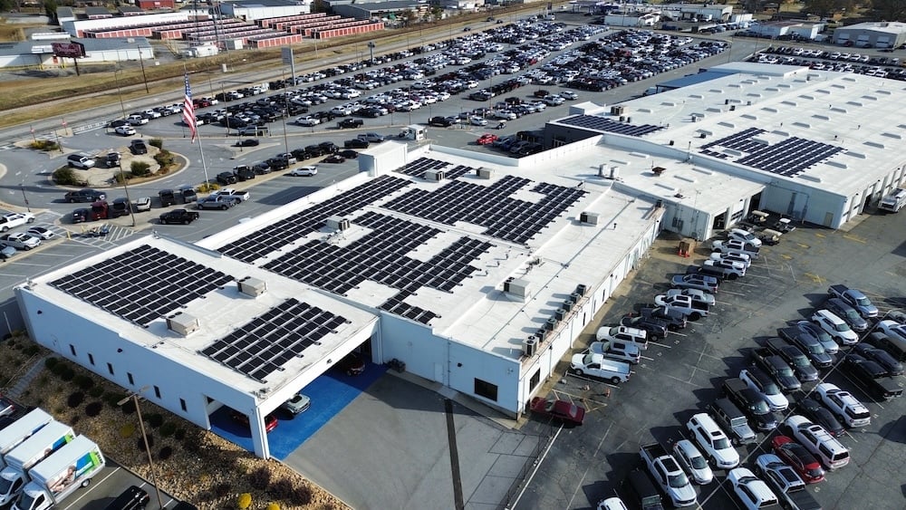 Akins Ford overview shot with solar panels on top of the building