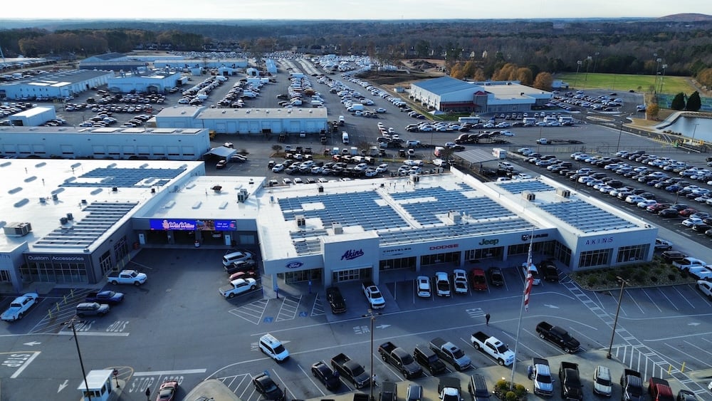 Akins Ford overview shot with solar panels on top of the building