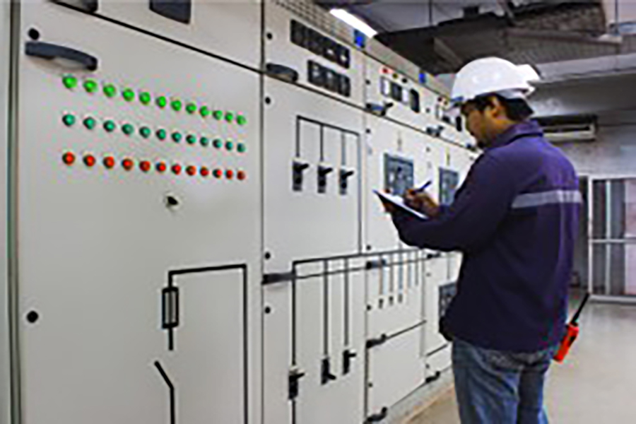 Person checking a DC power generator