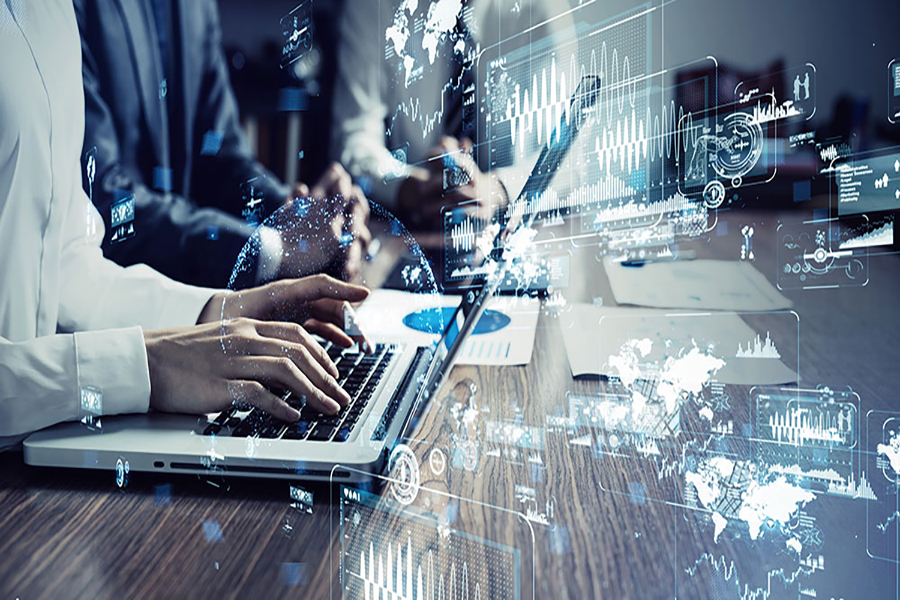 People working on computers with graphics of wifi connection over them