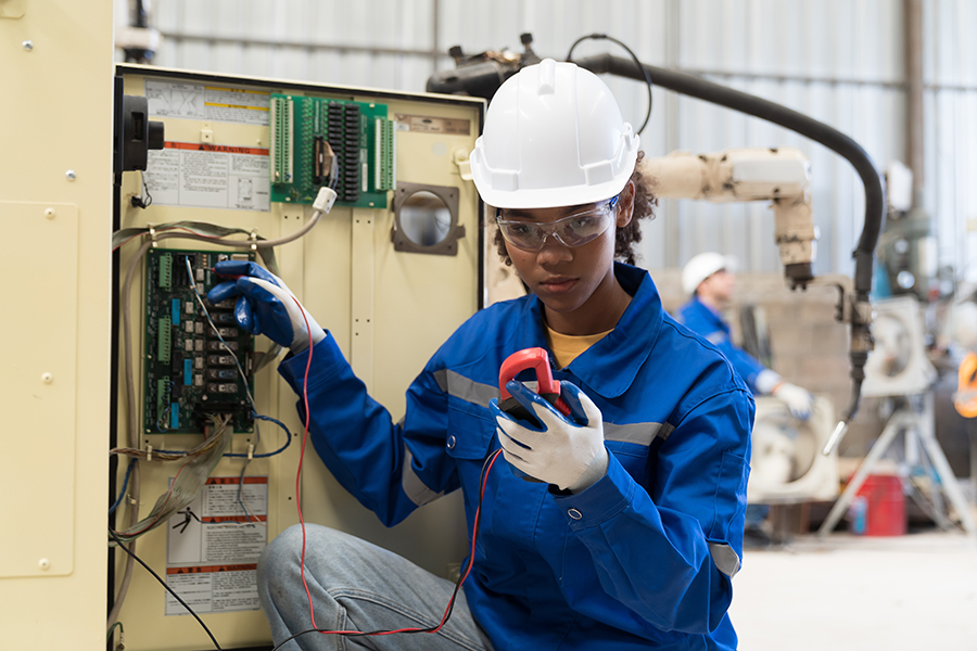 A female electrical contractor working