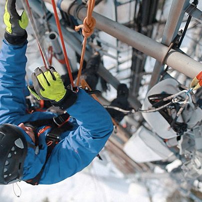 Person climbing a cell tower