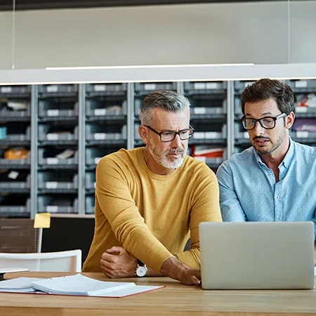 two men discussing network infrastructure services